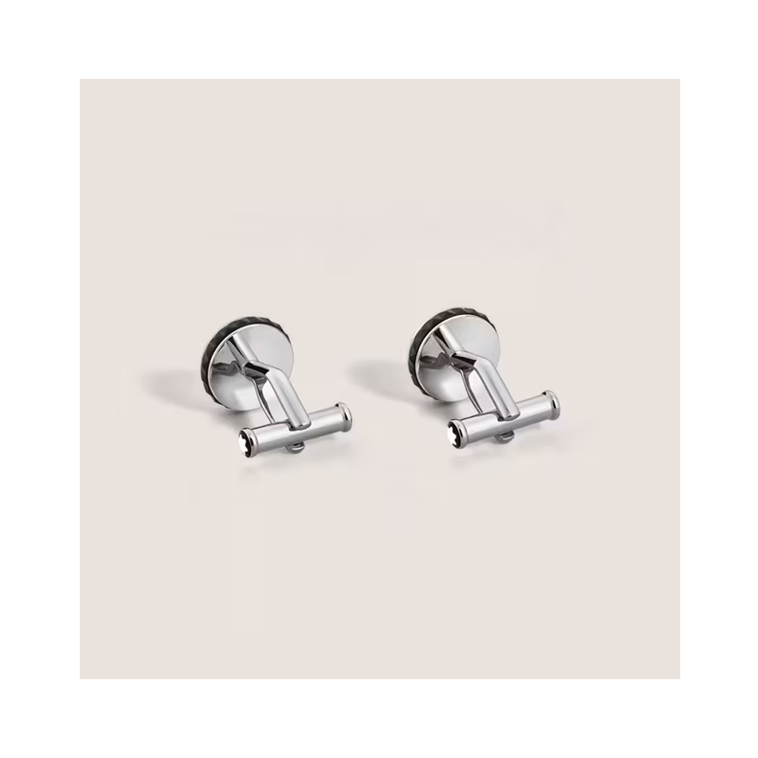 A pair of Montblanc, Great Characters Homage to Queen cufflinks in stainless steel featuring the Montblanc emblem.