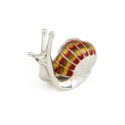 A sterling silver snail figurine from Saturno by Francis Howard.