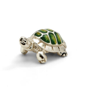 A sterling silver very small green tortoise figurine from Saturno by Francis Howard.