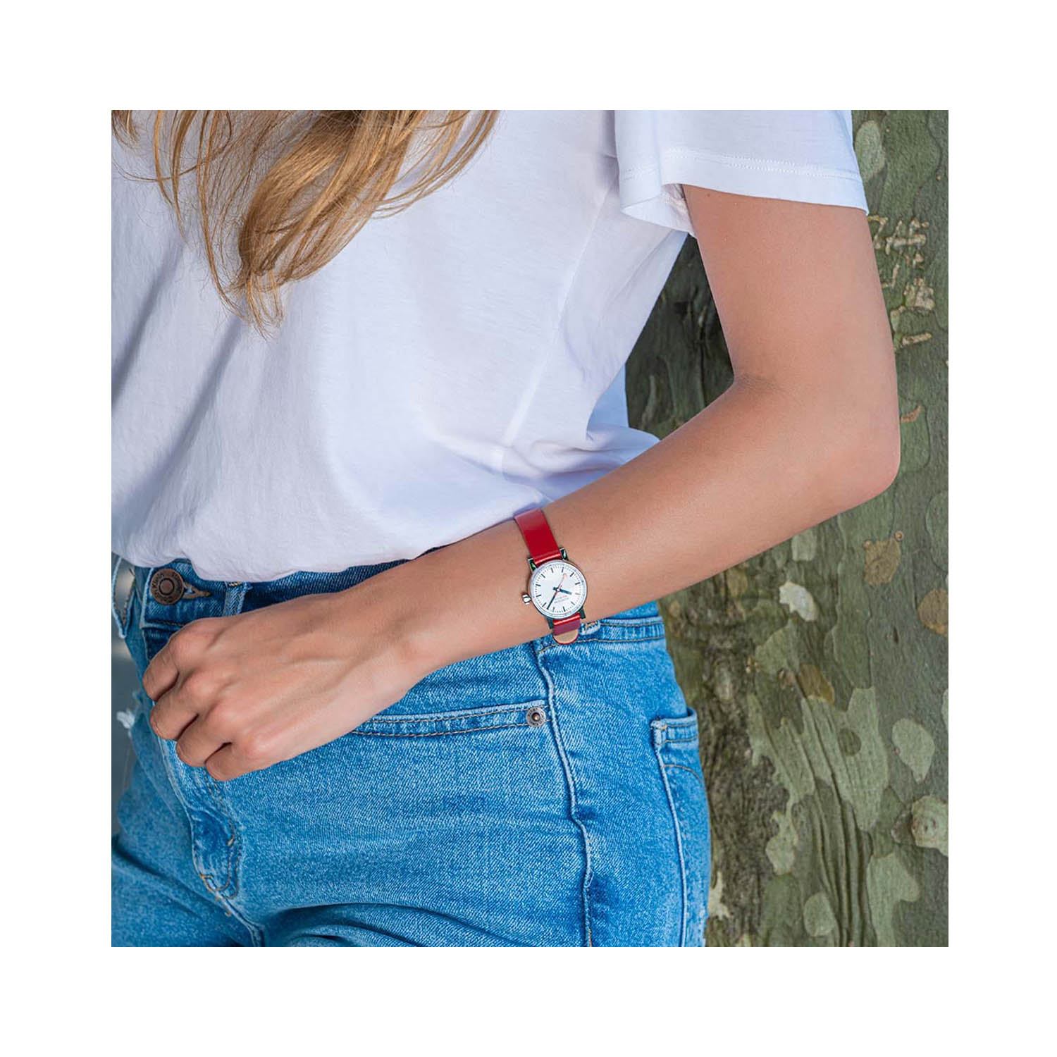 Mondaine, evo2 with a 26mm stainless steel case and a red vegan grape leather strap featuring a white dial.