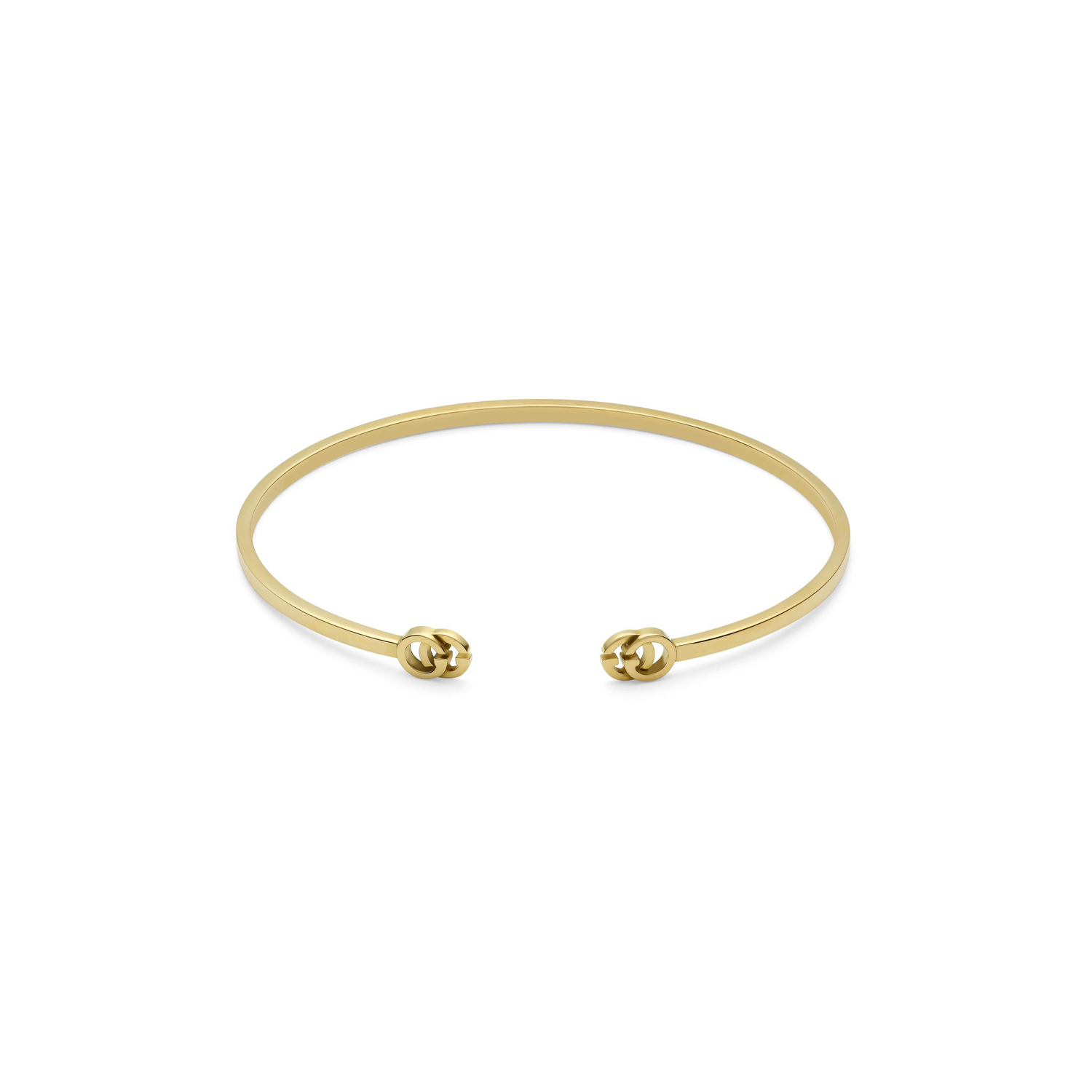 An 18ct yellow gold cuff bracelet from Gucci's GG Running collection.