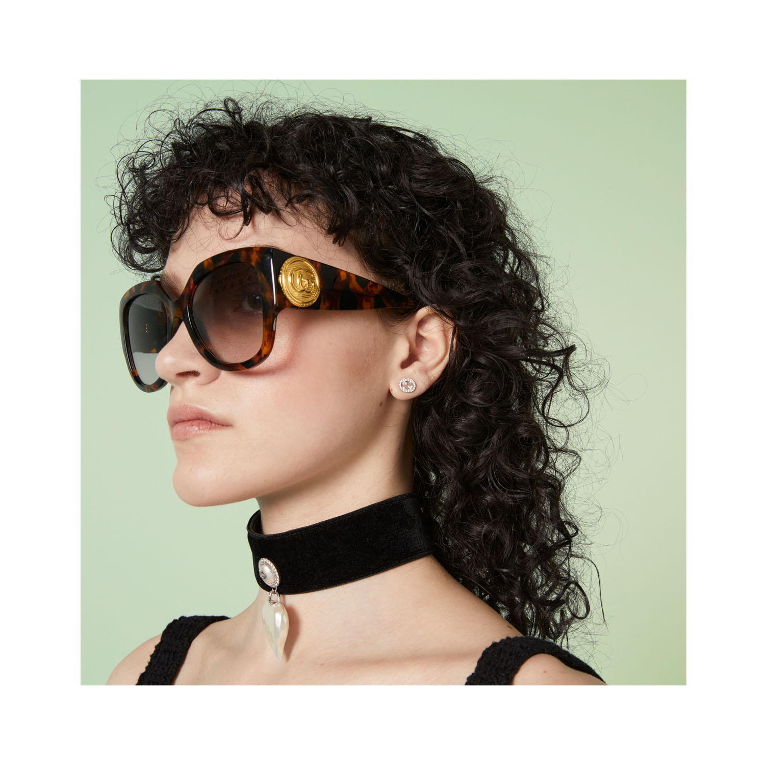 A pair of 18ct white gold, diamond set stud earrings for pierced ears from the Gucci Interlocking collection.