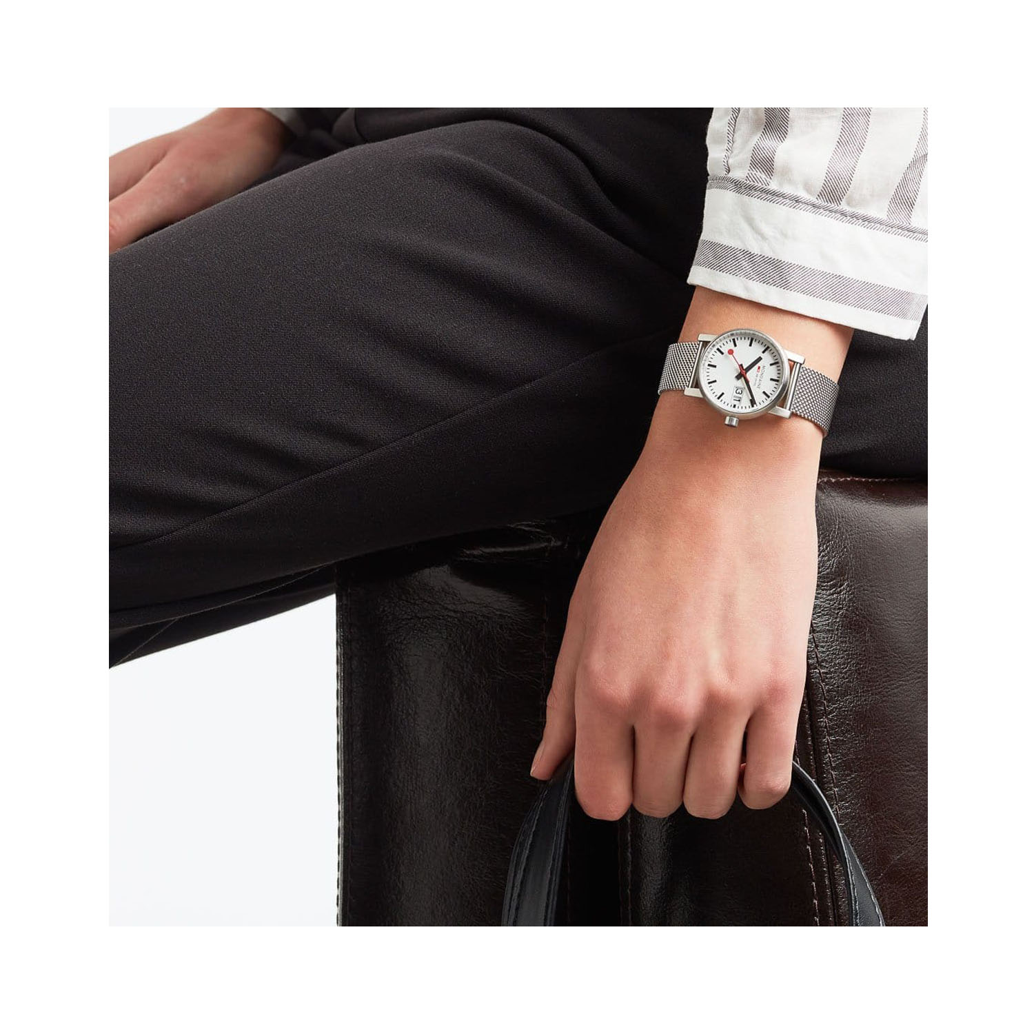 Mondaine, evo2 with a 30mm stainless steel case and bracelet strap featuring a date function and a white dial.