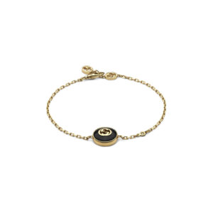 An 18ct yellow gold bracelet with black onyx and diamonds from the Gucci Interlocking collection.