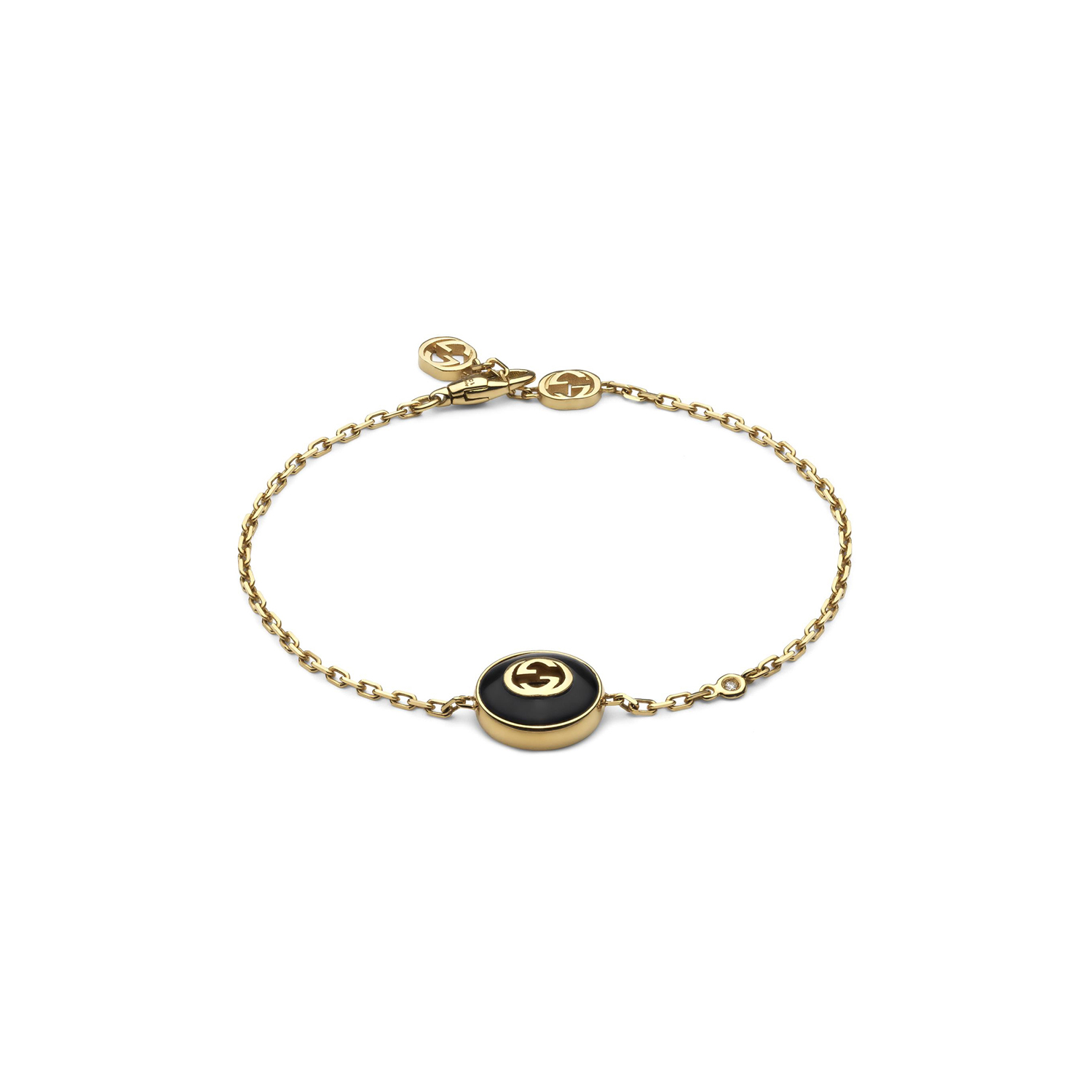 An 18ct yellow gold bracelet with black onyx and diamonds from the Gucci Interlocking collection.