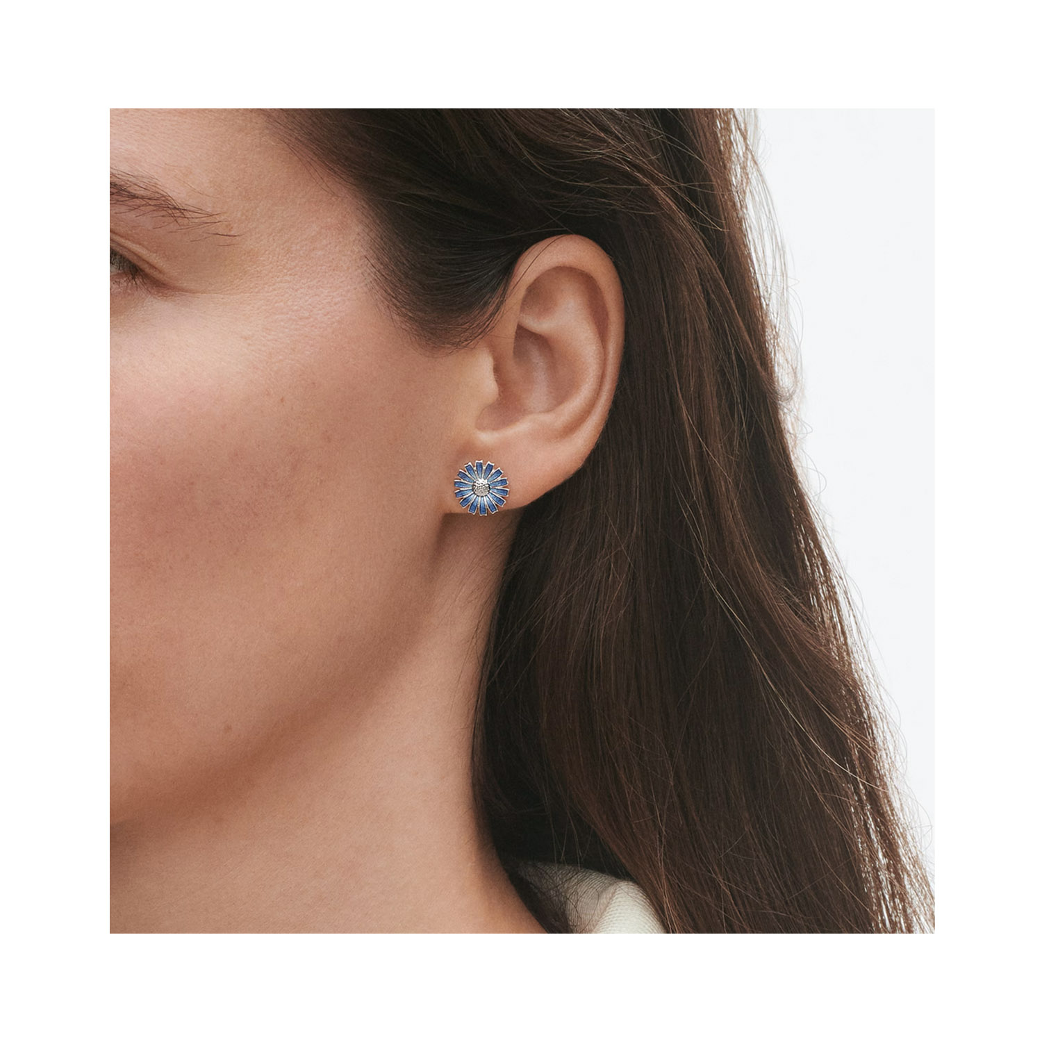 Georg Jensen, Sterling Silver Blue Daisy Ear Studs A pair of sterling silver and blue enamelled flower stud earrings, for pierced ears from Georg Jensen's Daisy Collection.