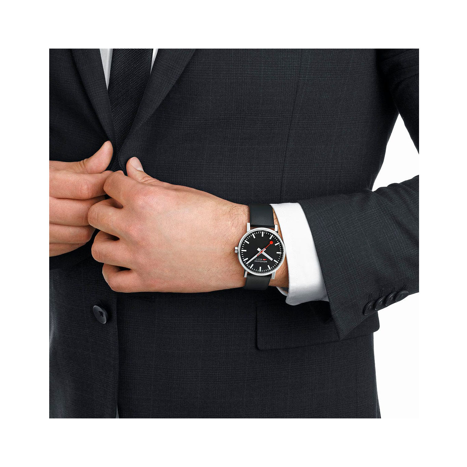 Mondaine, evo2 with a 43mm stainless steel case and a black vegan leather strap featuring a black dial.