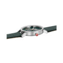 Mondaine, Classic Forest Green, Quartz Men's Watch Mondaine, Classic Forest Green with a 40mm stainless steel case and a green fabric strap featuring a green dial.