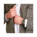 Mondaine, Classic Forest Green, Quartz Men's Watch Mondaine, Classic Forest Green with a 40mm stainless steel case and a green fabric strap featuring a green dial.