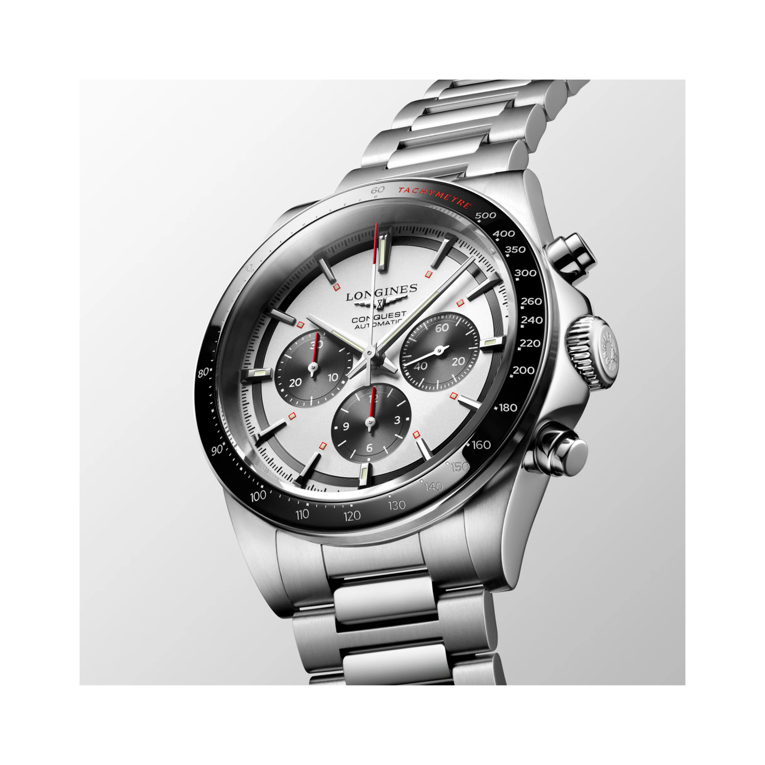 Longines, Conquest Chronograph, Automatic Men's Watch Longines, Conquest with a 42mm stainless steel case and bracelet strap featuring a chronograph, a silver and black dial with a black ceramic bezel.