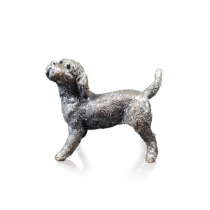 Made from solid foundry bronze, this piece depicts a happy, standing cockapoo dog.