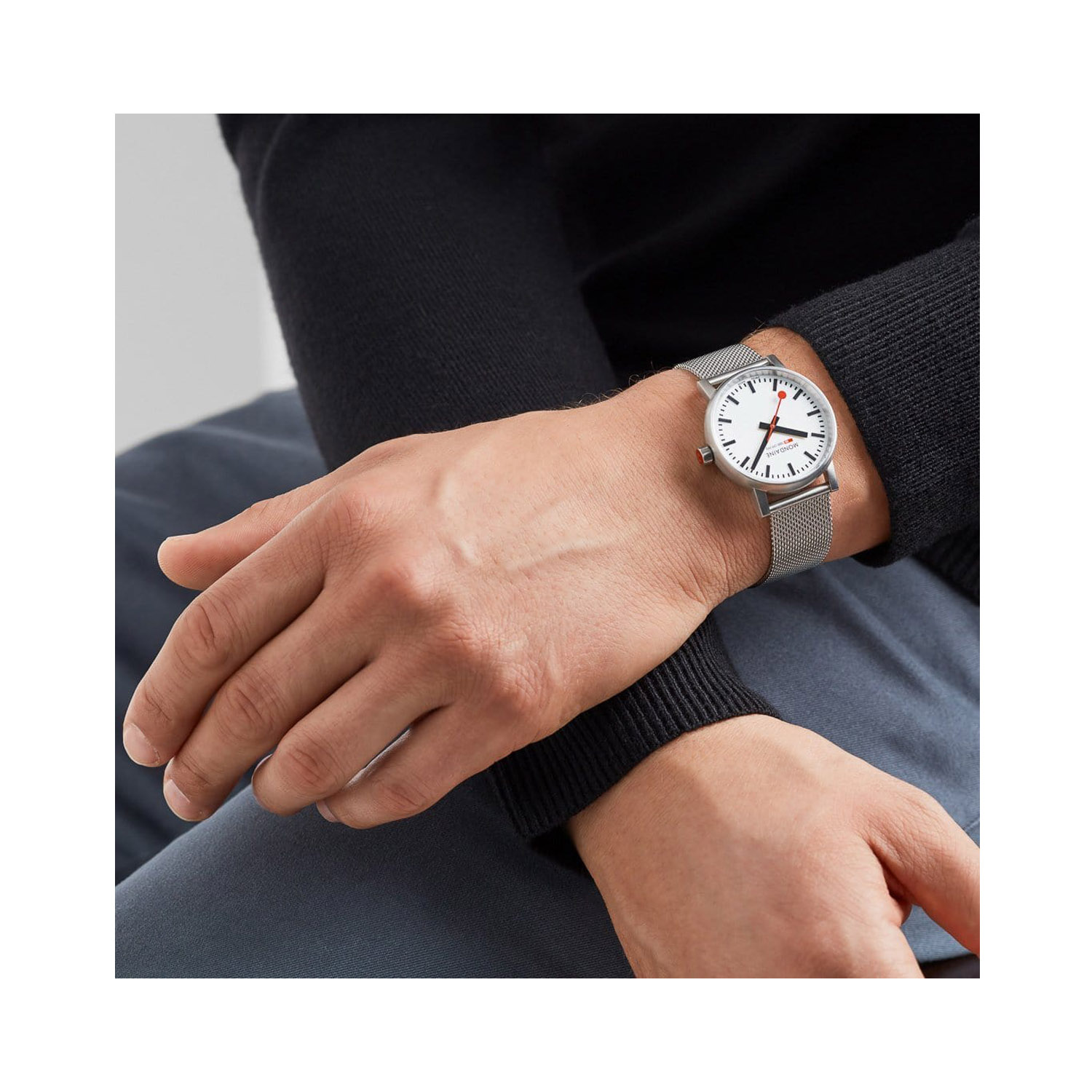 Mondaine, evo2 White Steel, Quartz Unisex Watch Mondaine, evo2 with a 35mm stainless steel case and bracelet strap featuring a white dial.