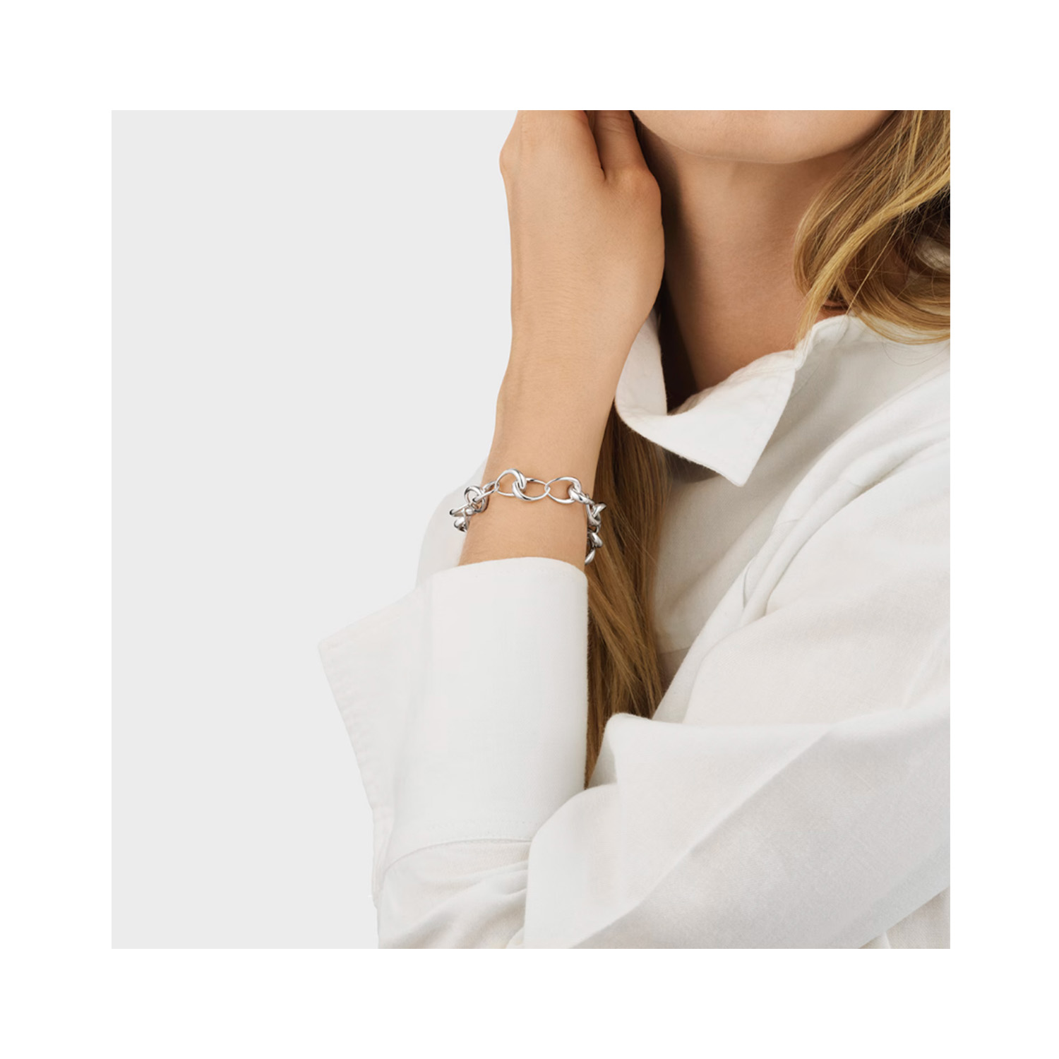 A sterling silver circular link bracelet from Georg Jensen's Offspring collection.