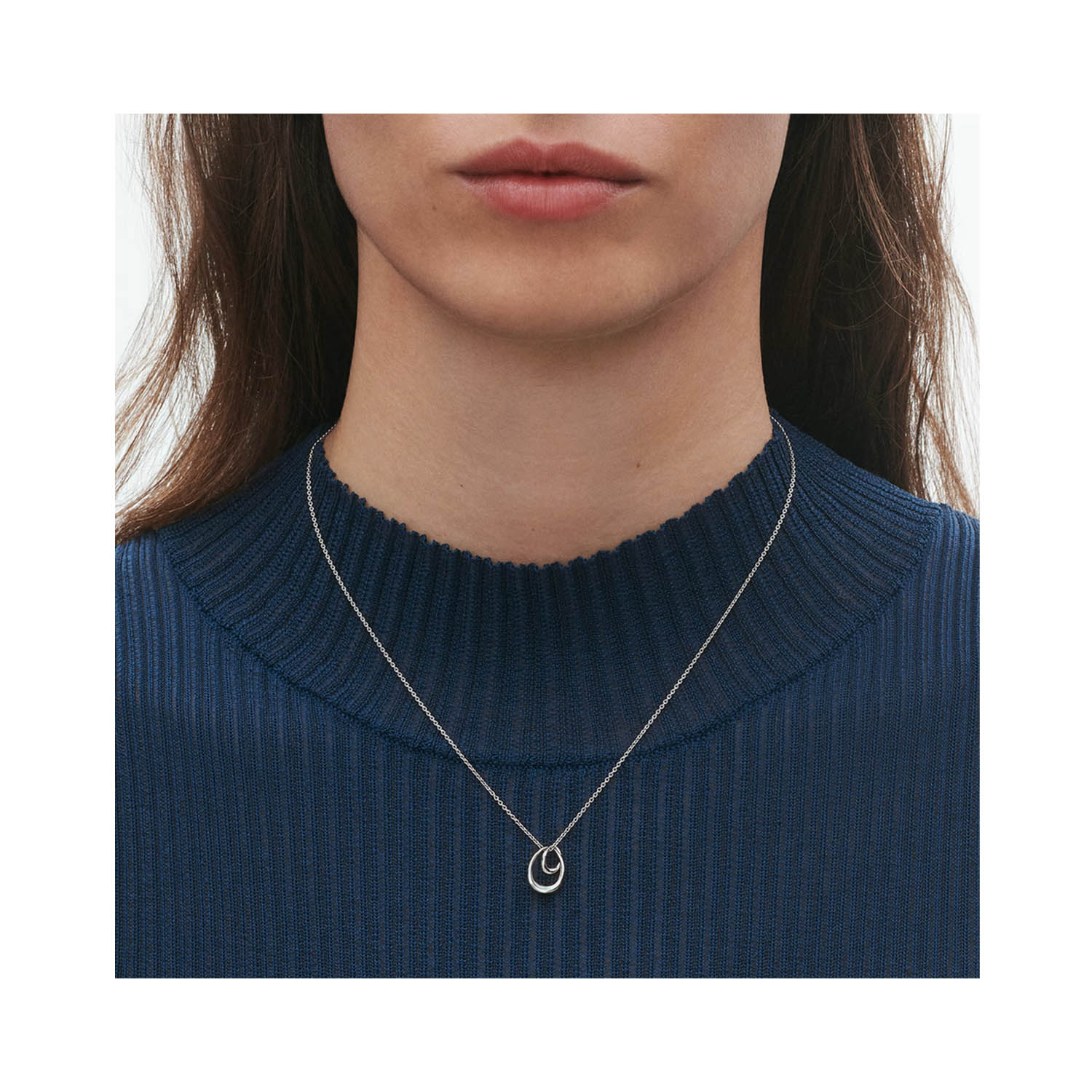 Georg Jensen, Sterling Silver Offspring Small Pendant & Chain A sterling silver small interlocking pendant and chain belonging to Georg Jensen's Offspring collection.