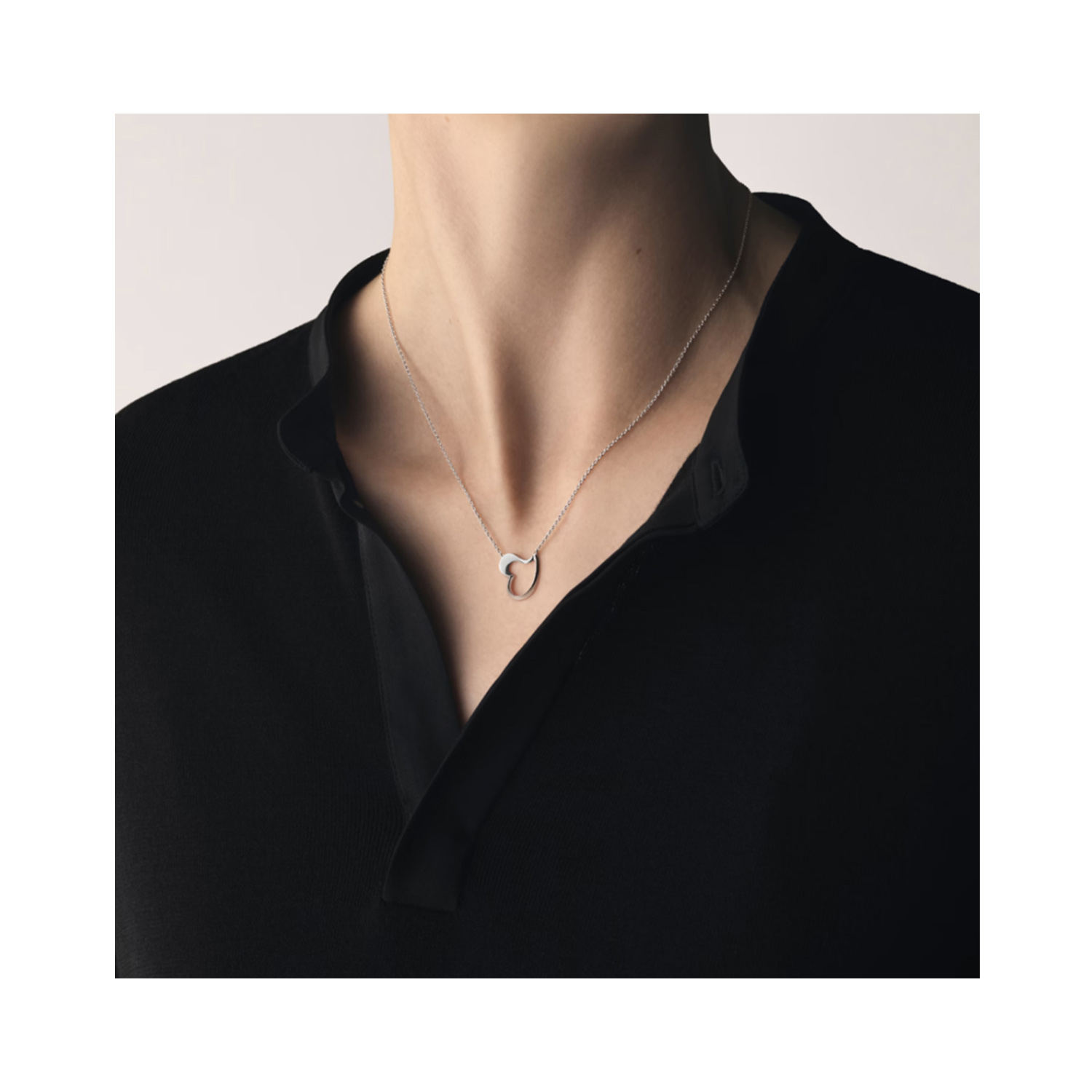 A sterling silver necklace with a leaf shaped love heart pendant from Georg Jensen's Hearts of Georg Jensen collection.