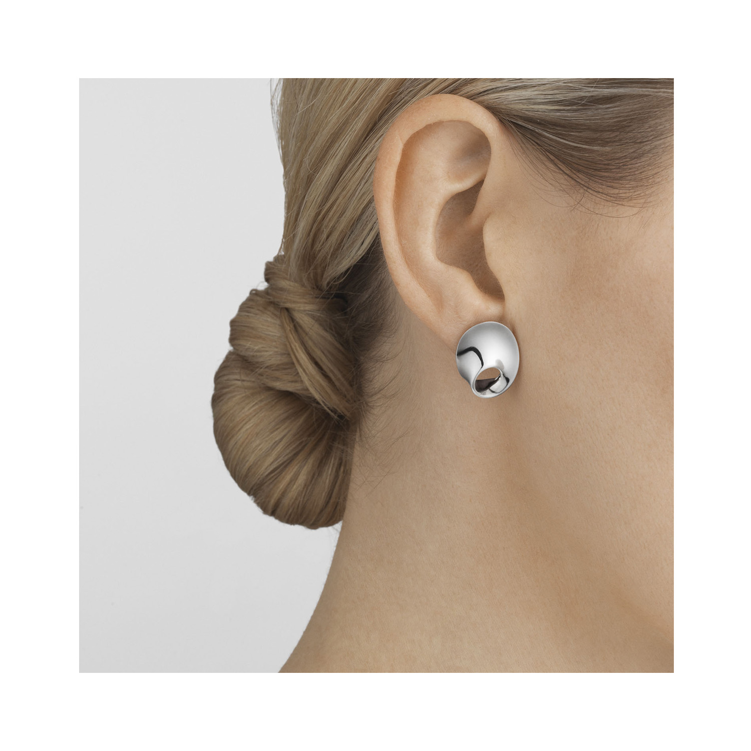 Georg Jensen, Sterling Silver Möbius Earclips A pair of polished sterling silver earclips belonging to Georg Jensen's Möbius collection.