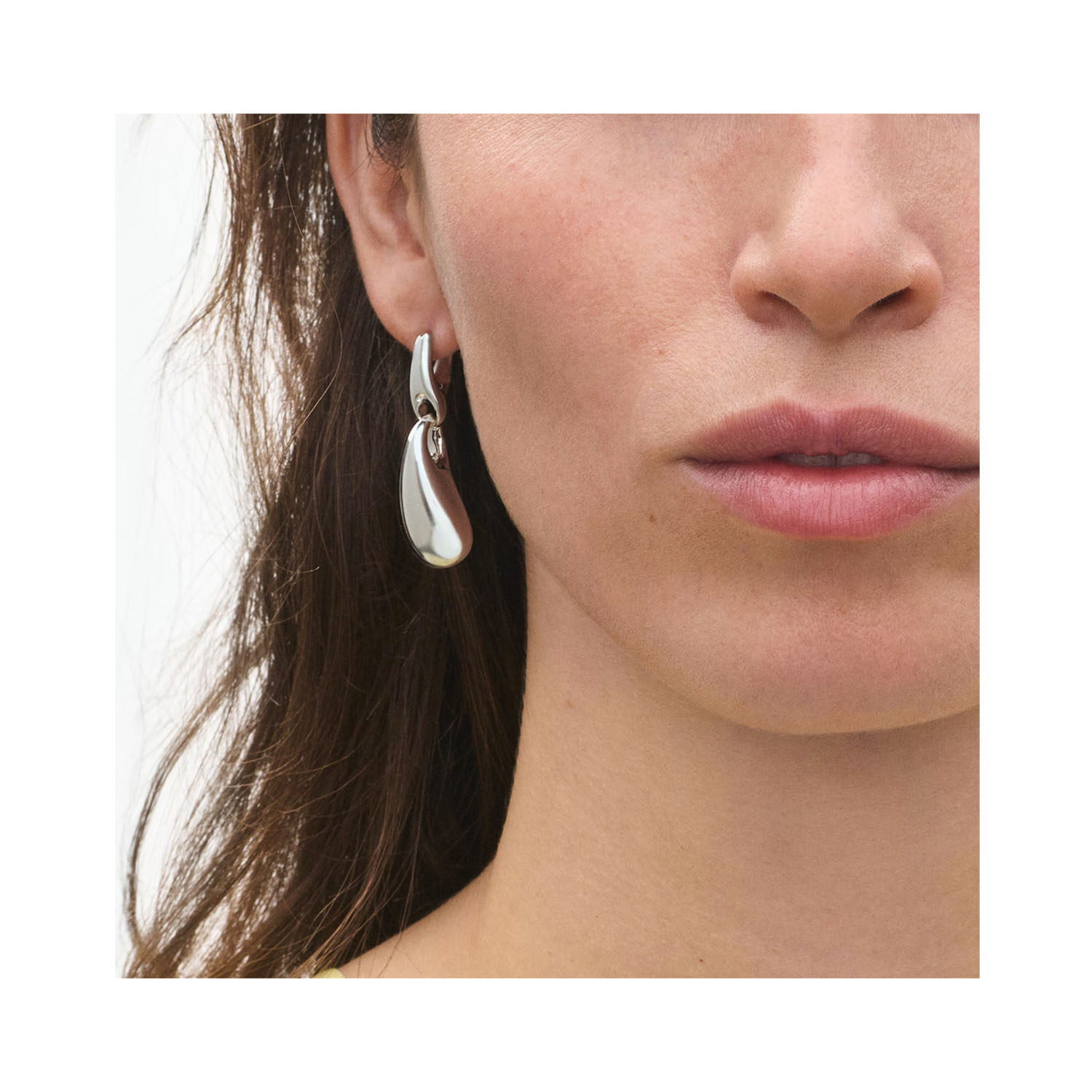 Georg Jensen, Sterling Silver Reflect Earrings A pair of sterling silver, hinged hoop drop earrings from Georg Jensen's Reflect collection, for pierced ears.