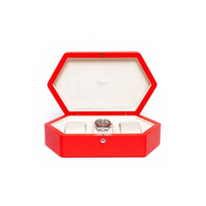 A hexagonal shaped watch box in premium grained red leather that holds up to three watches.