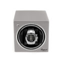 An evocube watch winder, crafted in wood finished with lacquer.