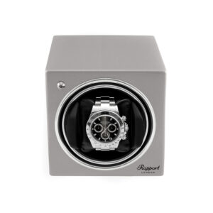 An evocube watch winder, crafted in wood finished with lacquer.
