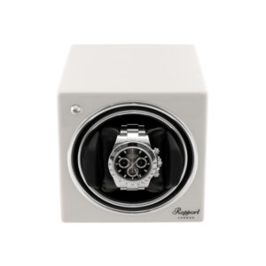 An evocube watch winder, crafted in wood finished with lacquer.