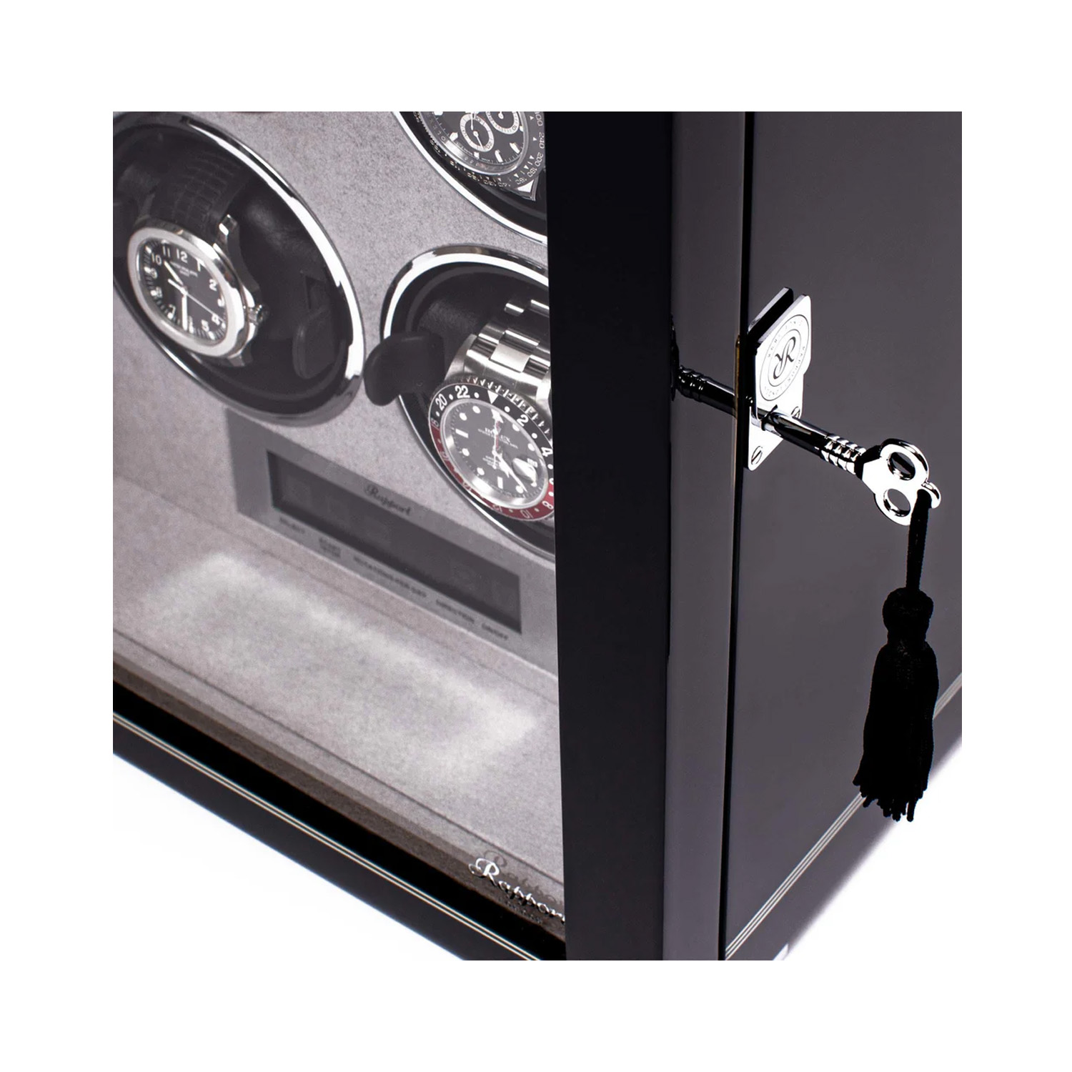 A black lacquered watch winder with space for six watches on patented leather cushions.