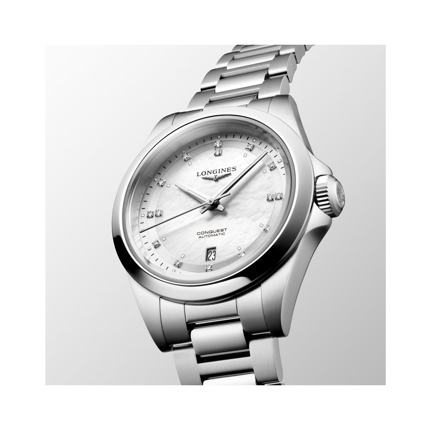 Longines, Conquest with a 30mm stainless steel case and bracelet strap featuring a date function and a white mother of pearl, diamond set dial.
