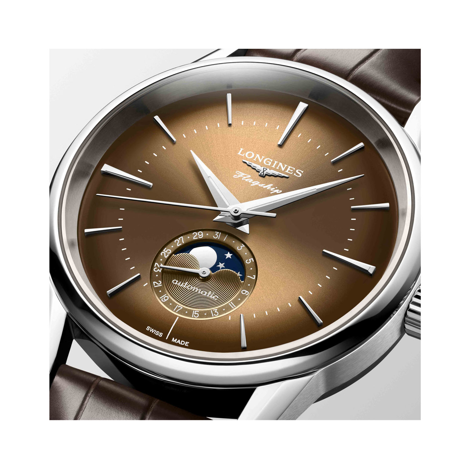 Longines, Flagship Heritage with a 38.5mm stainless steel case and a brown leather strap featuring a moonphase and a havana beige dial.