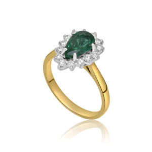 An 18ct yellow and white gold pear shaped emerald and diamond cluster ring.