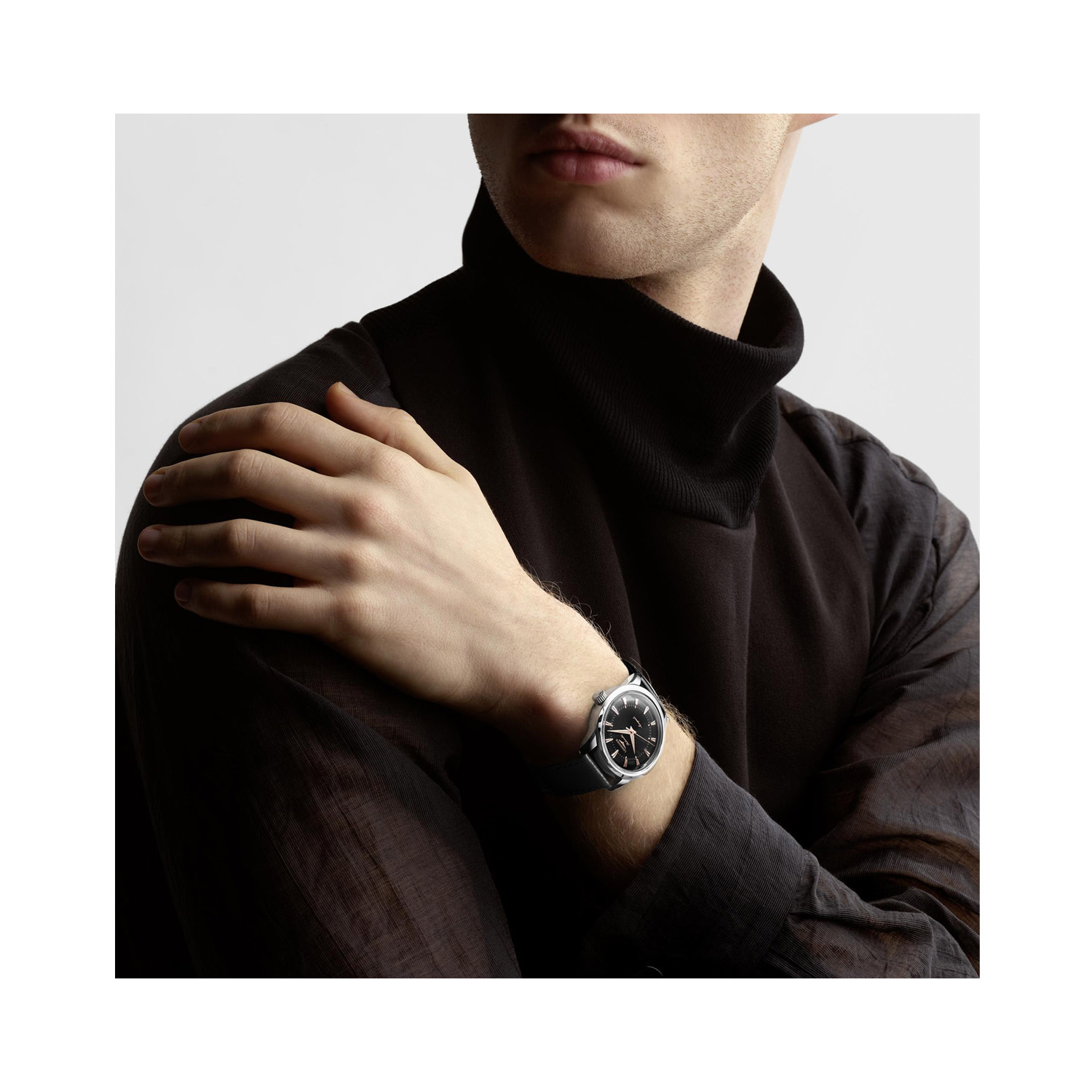 Longines, Conquest Heritage with a 38mm stainless steel case and a black leather strap featuring a black dial.