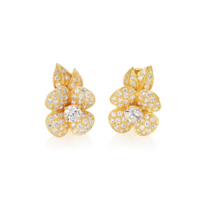 A pair of 18ct yellow gold floral diamond cluster earrings on clip and post fittings, for pierced ears.