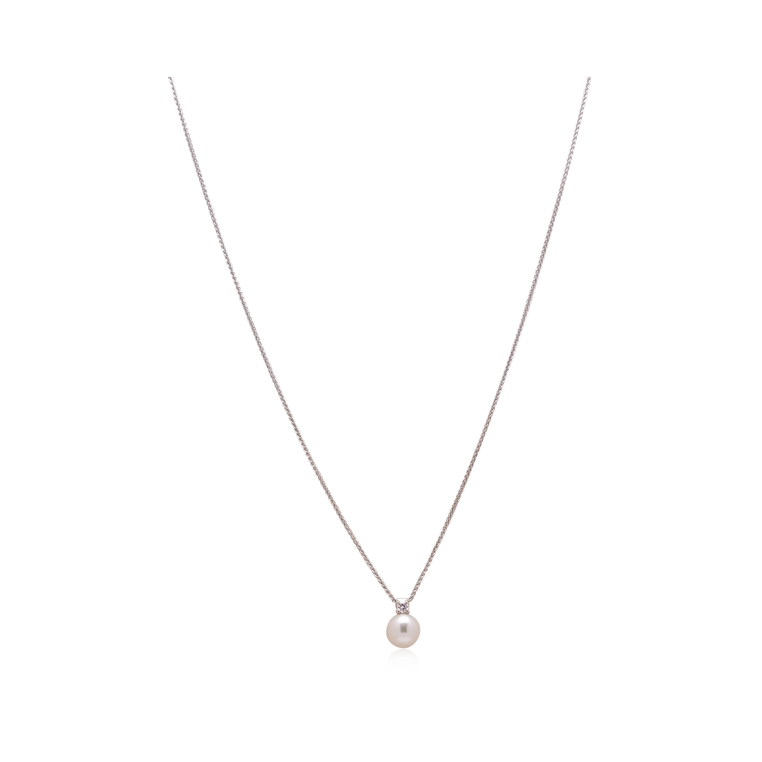 An 18ct white gold single akoya pearl and diamond drop pendant and chain.
