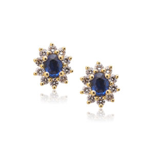 A pair of 18ct yellow gold oval sapphire and diamond set cluster stud earrings, for pierced ears.
