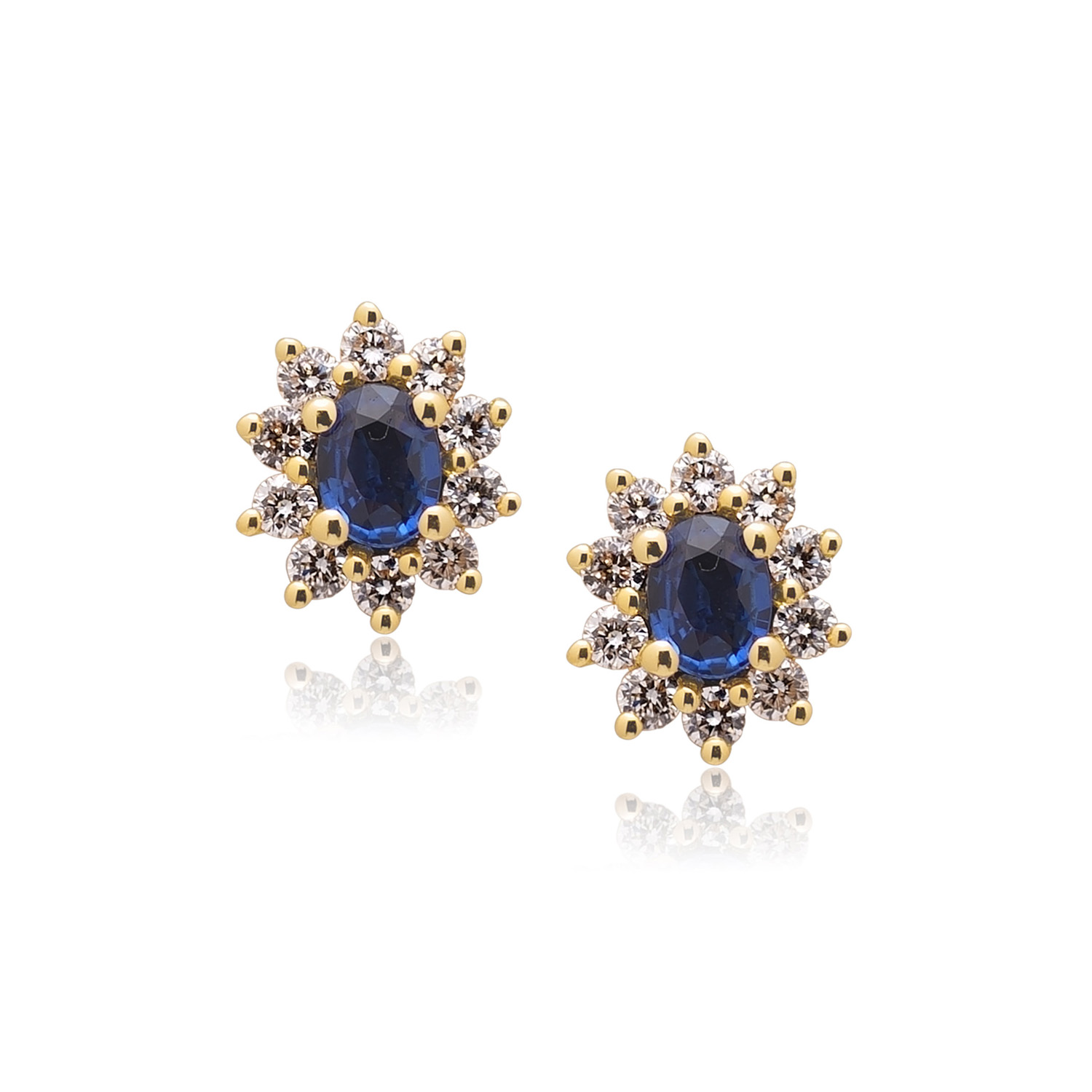 A pair of 18ct yellow gold oval sapphire and diamond set cluster stud earrings, for pierced ears.