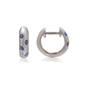 A pair of 18ct white gold hoop style earrings set with four sapphires on each earring, for pierced ears.