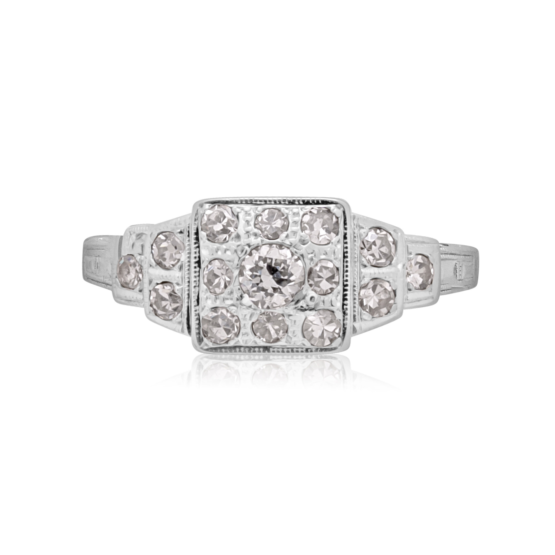 An Art Deco square diamond set cluster ring with Odeon style diamond shoulders in 14ct white gold.