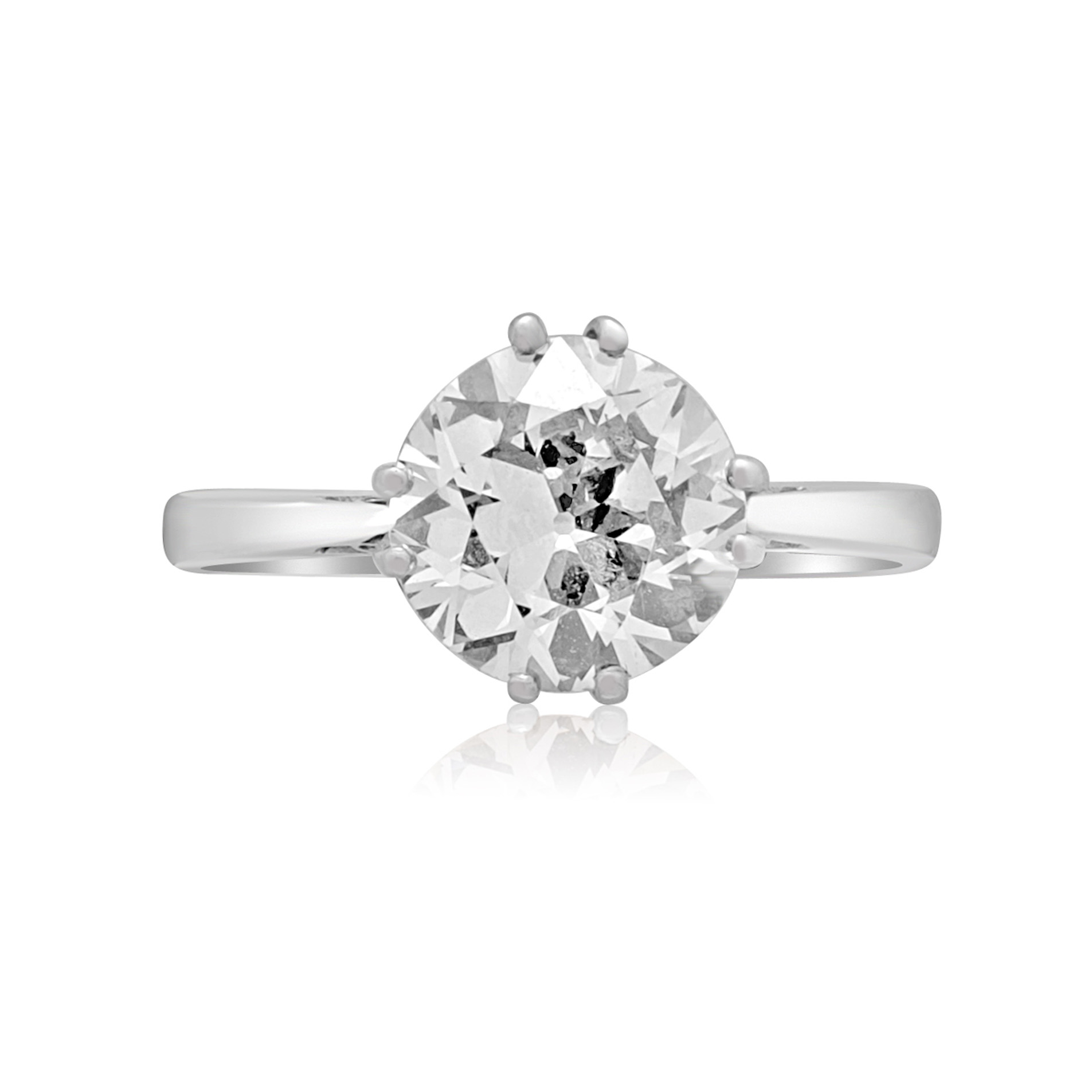 A vintage platinum single stone old brilliant cut diamond solitaire ring.