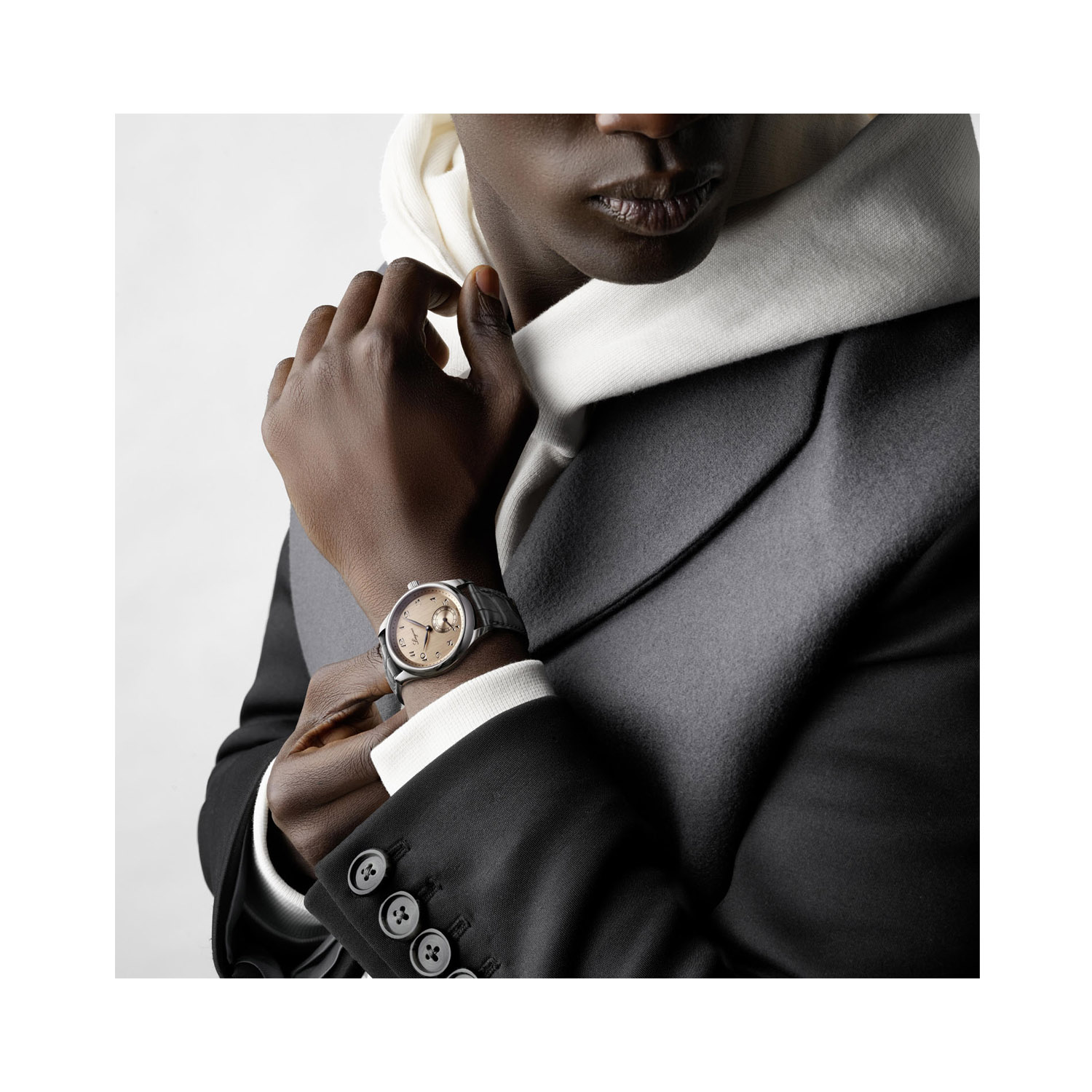 Longines, Master Collection with 38.5mm stainless steel case and a grey leather strap featuring a small seconds hand and a salmon coloured dial.