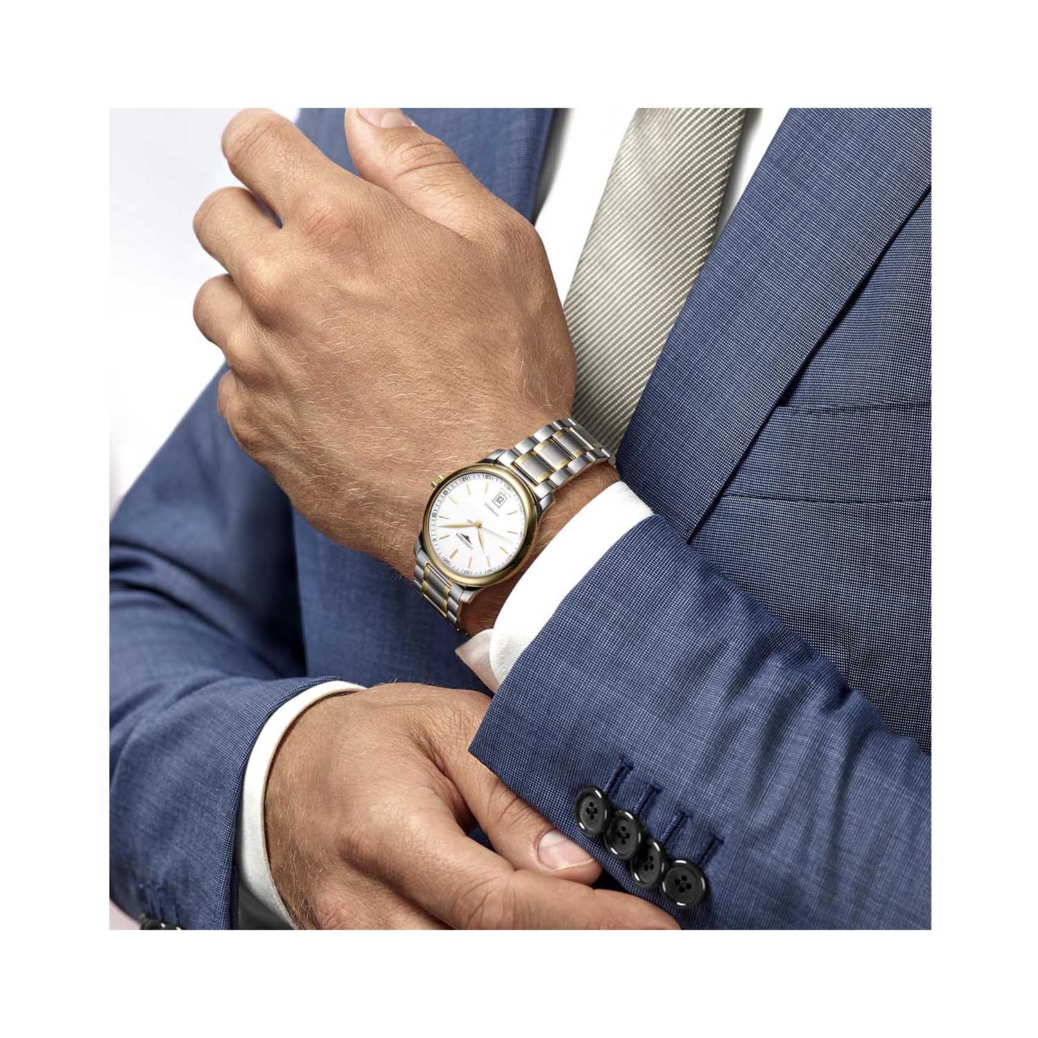 Longines, Master Collection with a 38.5mm stainless steel and yellow gold PVD coated case and bracelet strap featuring a date function and a white dial.