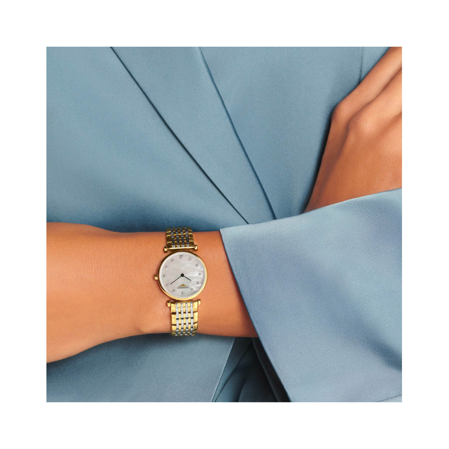 Longines, La Grande Classique with a 24mm stainless steel yellow PVD coated case and bracelet strap featuring a mother of pearl diamond set dial.