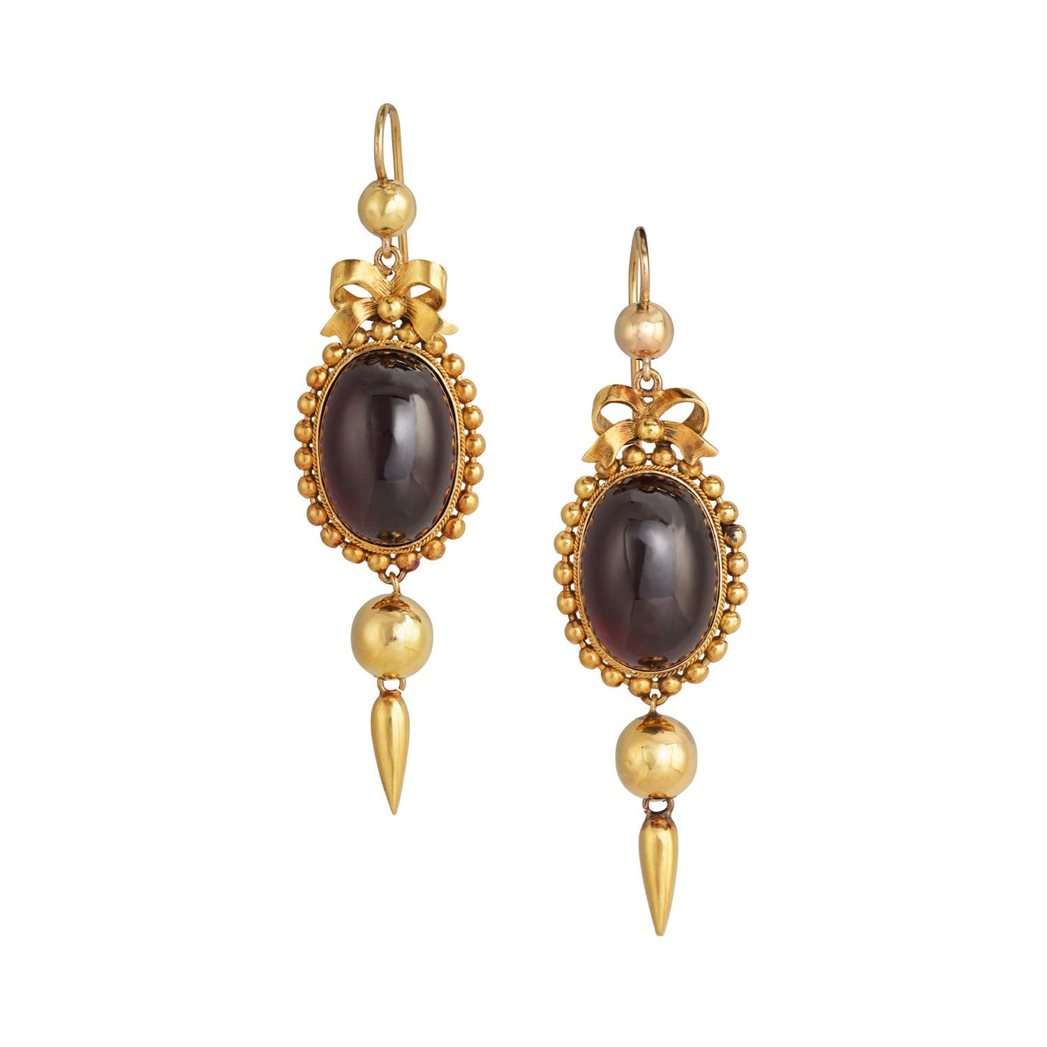A pair of late Victorian cabochon garnet drop earrings, for pierced ears.