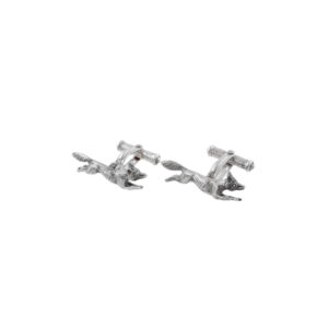 A pair of running fox cufflinks crafted in silver.