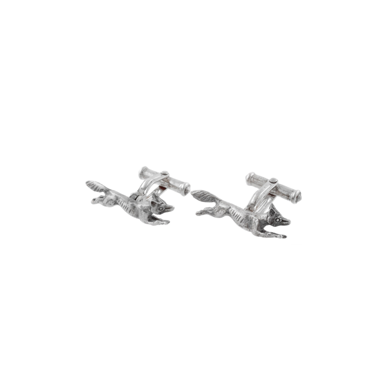 A pair of running fox cufflinks crafted in silver.