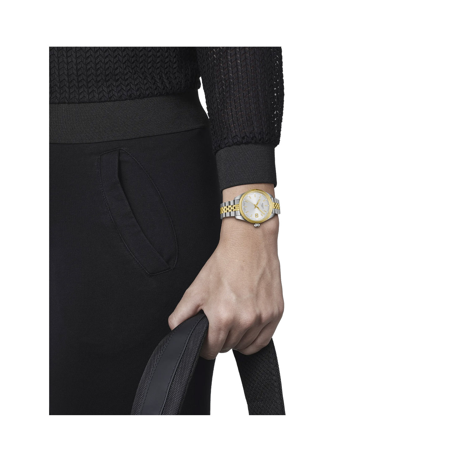 Tissot, Ballade with a 34mm stainless steel and yellow gold PVD coated case and bracelet strap featuring a date function and a silver guilloché dial.