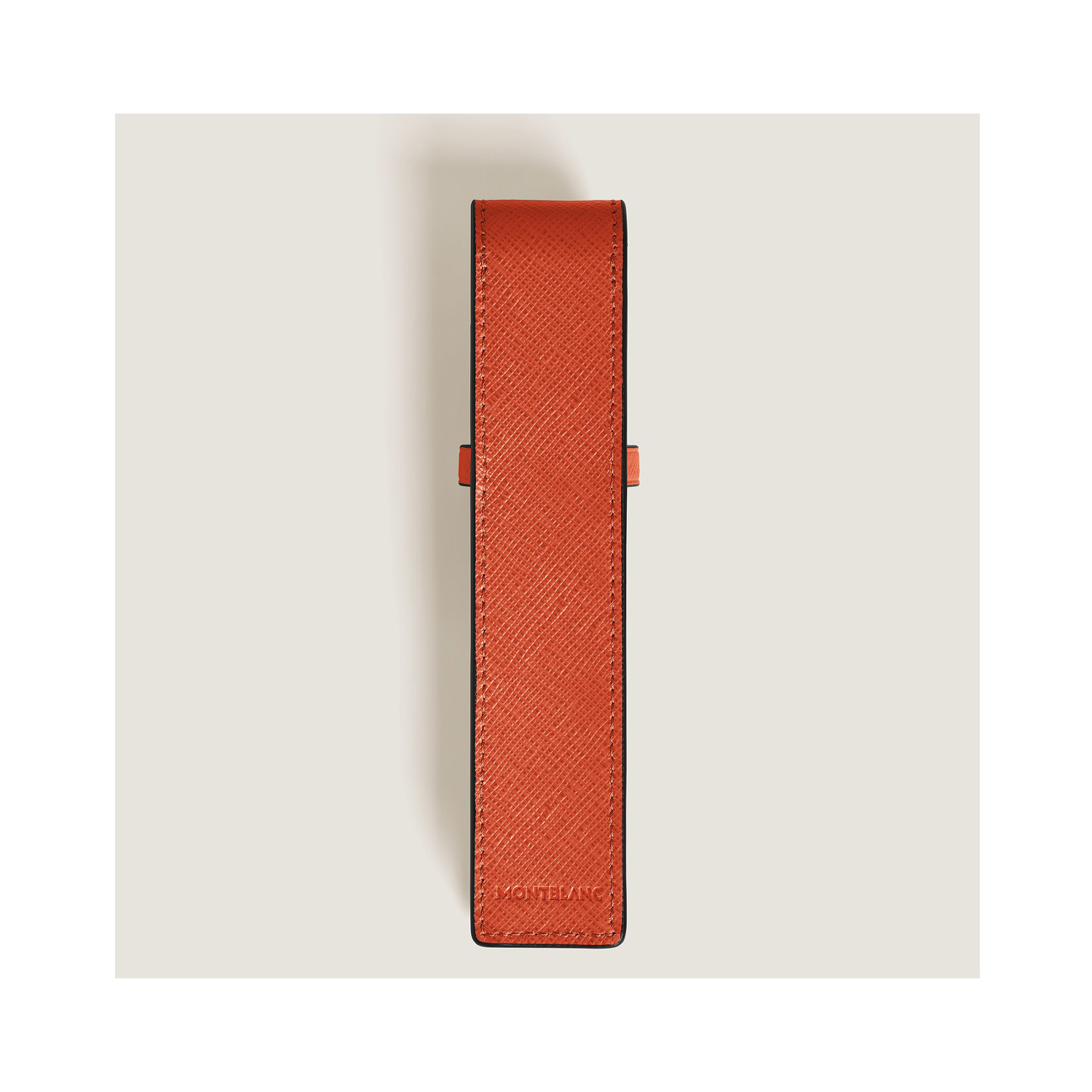 A Montblanc, Envelope tangerine pen pouch crafted in embossed sartorial leather with space to hold one writing instrument with a folding closure.