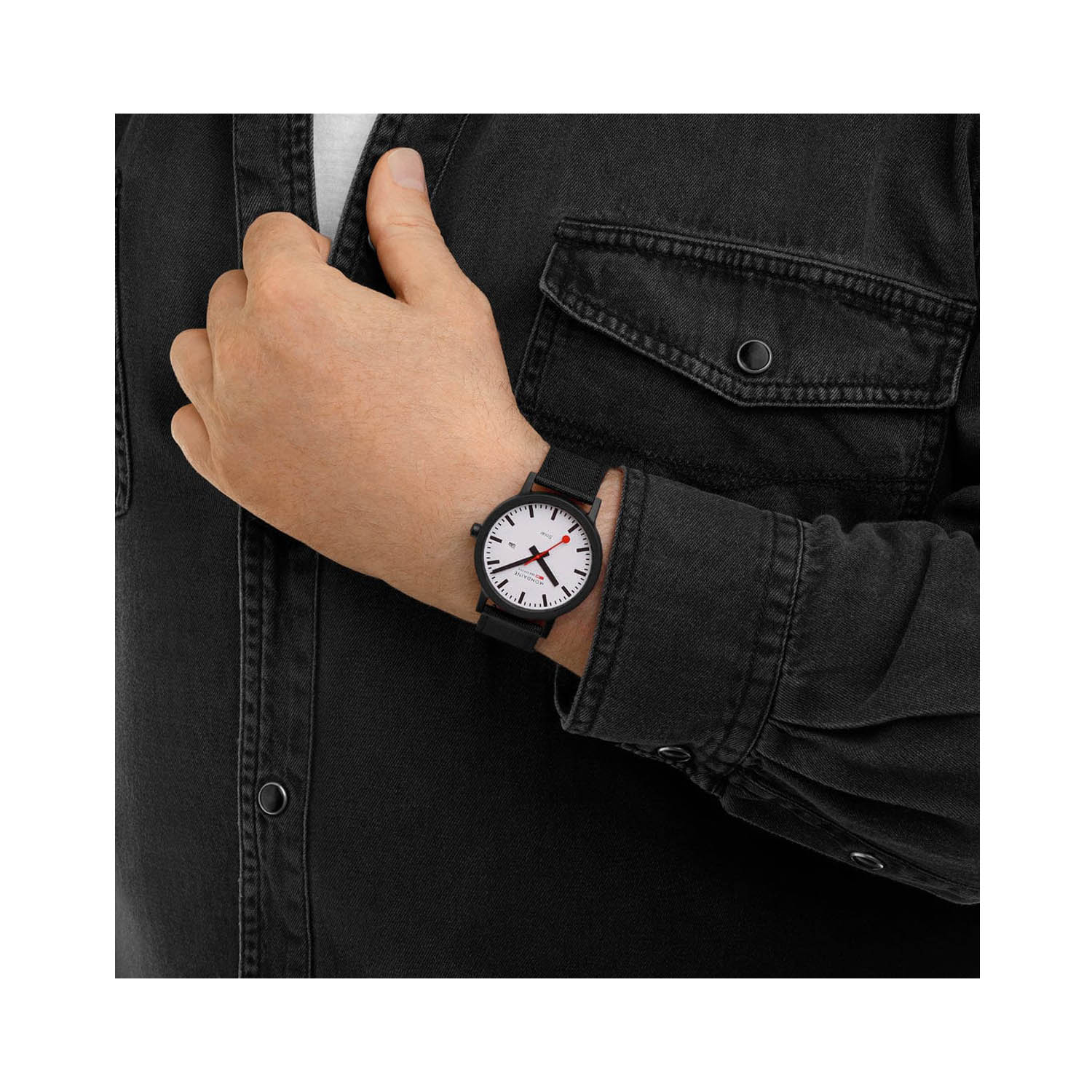 Mondaine, Essence with a 41mm stainless steel case and a black nylon strap featuring a date function and a white dial.