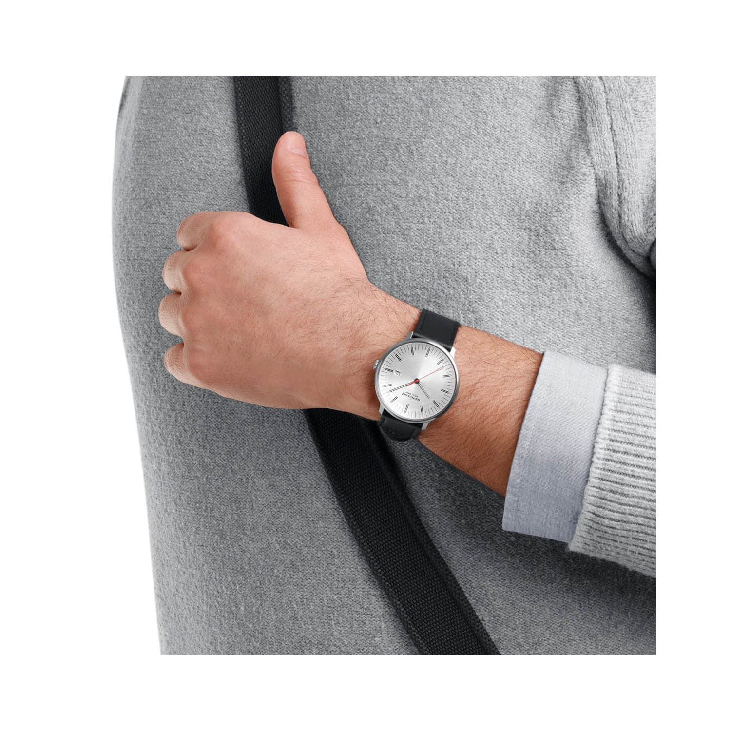 Mondaine, Doppio with a 41mm stainless steel case and a black vegan grape leather strap featuring a date function and a white dial.