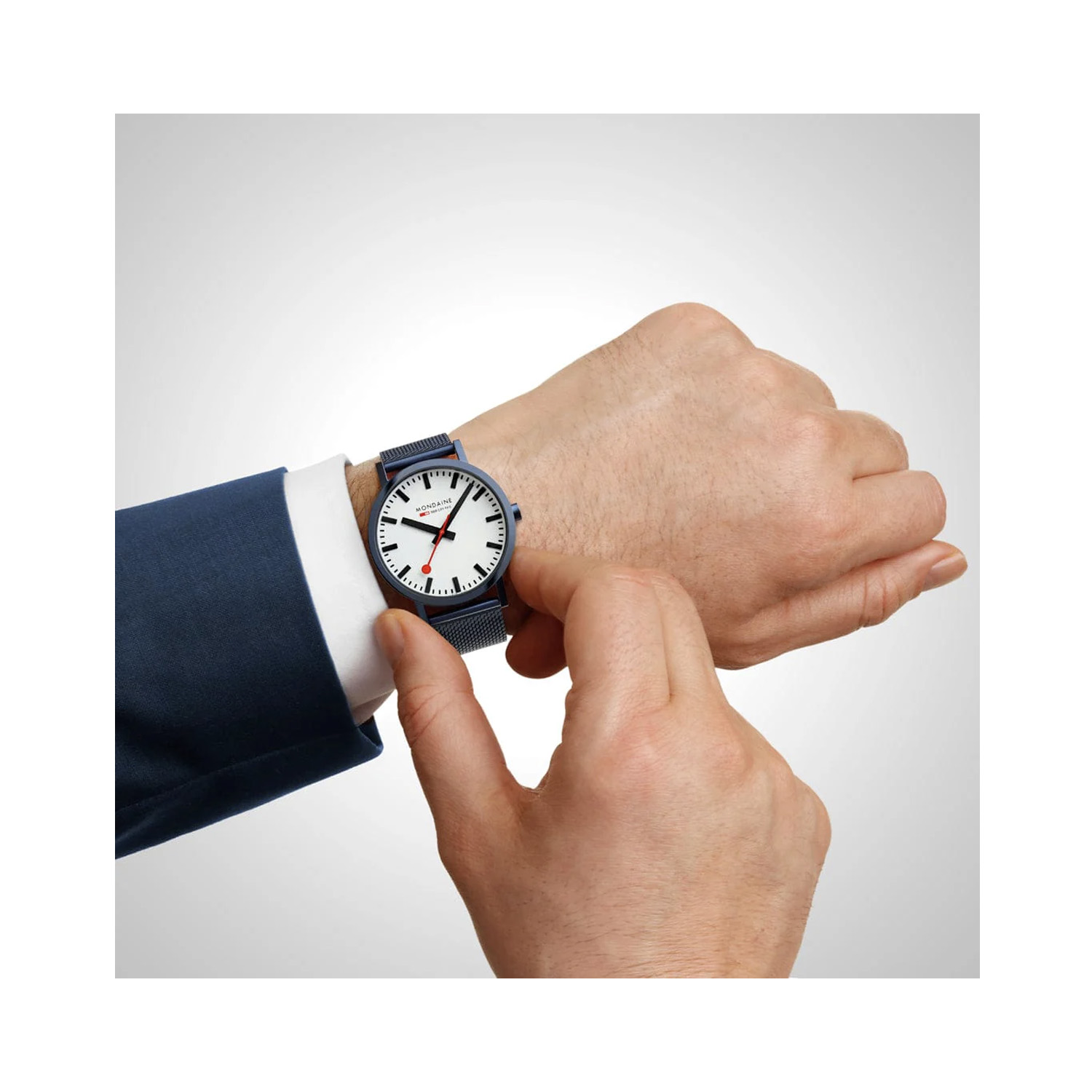 Mondaine, Classic with a 40mm stainless steel IP blue brushed case and bracelet strap featuring a white dial.