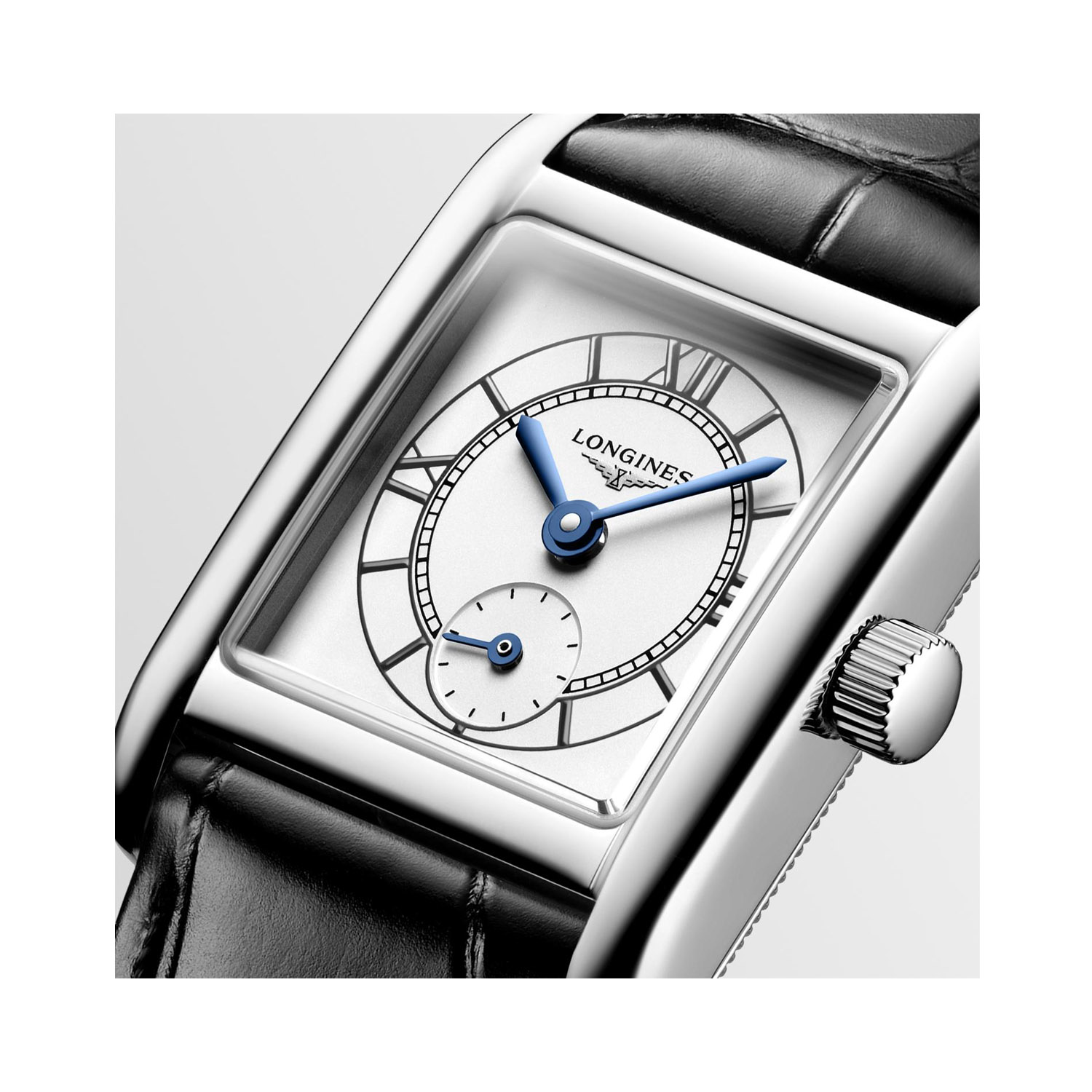 Longines, Mini DolceVita with a 21.5 x 29mm stainless steel case and black leather strap featuring a small seconds hand and a silver dial.