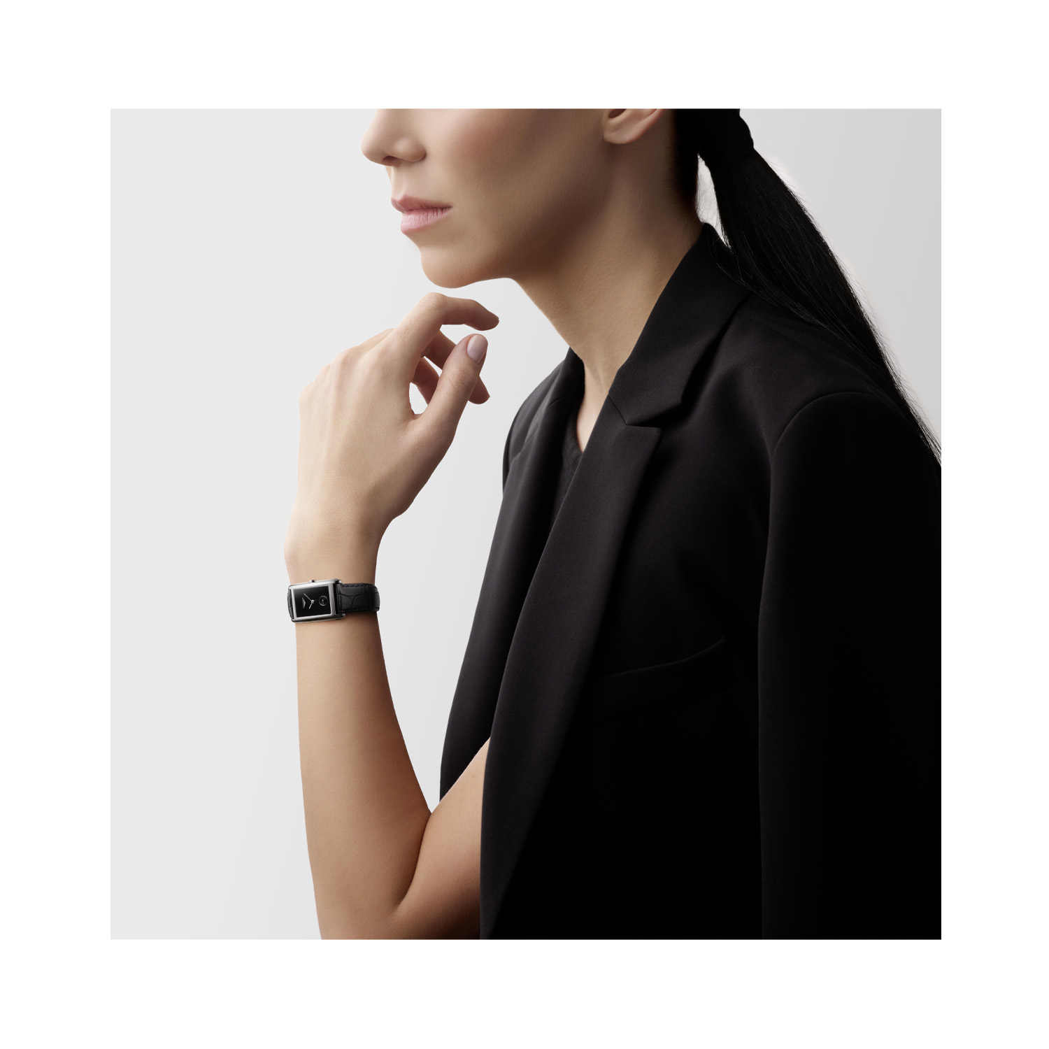 Longines, DolceVita with a 23.3 x 37mm stainless steel case and black leather strap featuring a small seconds hand and a black dial.